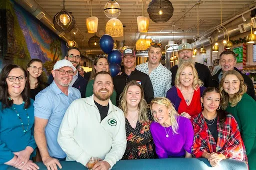 Blue Pebble agents, loan officers and staff together at the company holiday event